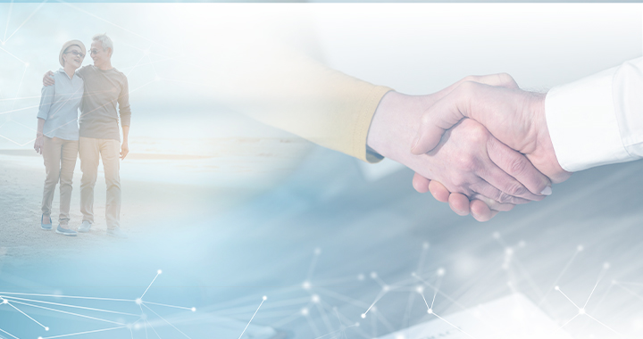 old couple signing papers